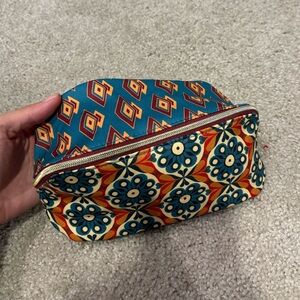 Estee Lauder Teal and Burgundy Patterned Pouch